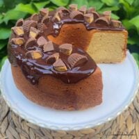 Peanut Butter Pound Cake, sliced, on a cake pedestal.