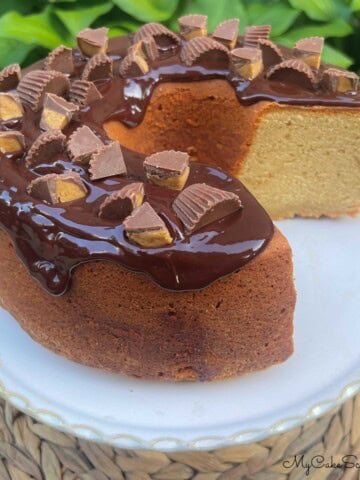 Peanut Butter Pound Cake, sliced, on a cake pedestal.