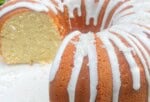 Coconut Mascarpone Pound Cake on a pedestal.