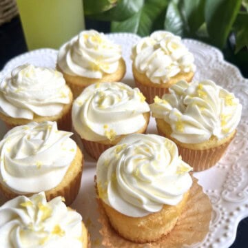 Limoncello Cupcakes from cake mix, placed on a pedestal.