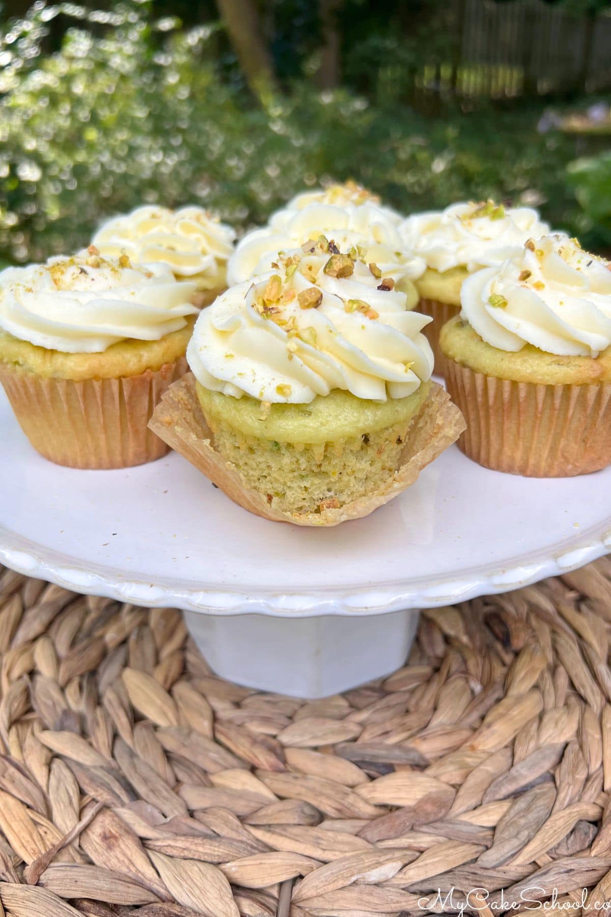 Pistachio Cupcakes on a platter.