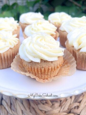 Apple Spice Cupcakes on a cake pedestal.