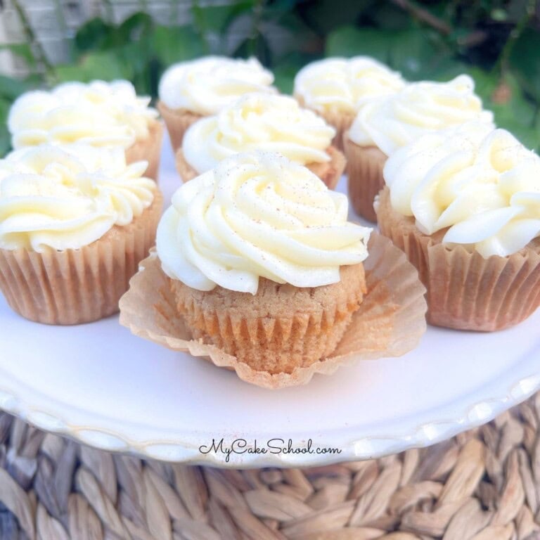 Apple Spice Cupcakes on a cake pedestal.