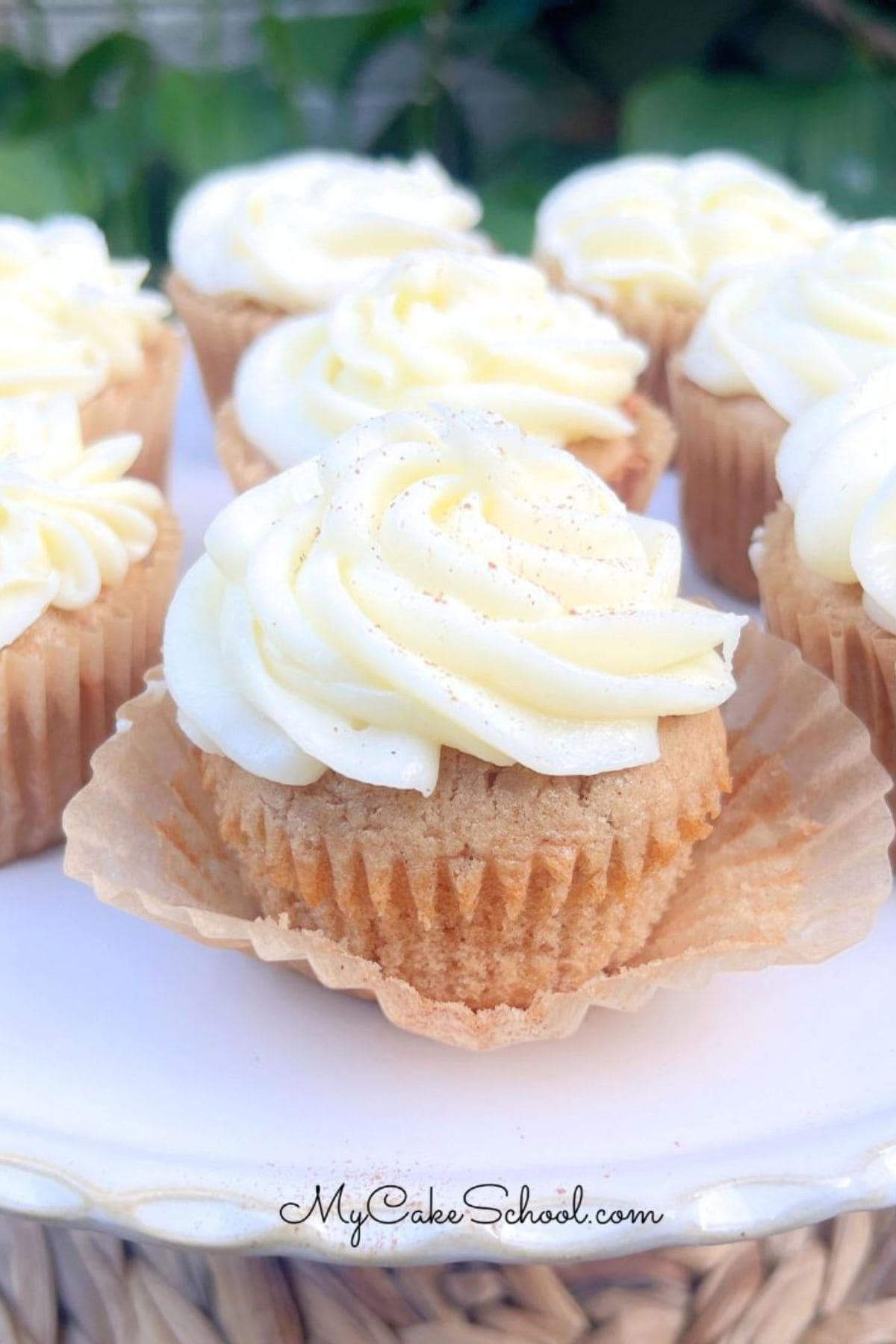 Apple Spice Cupcakes on a cake pedestal.