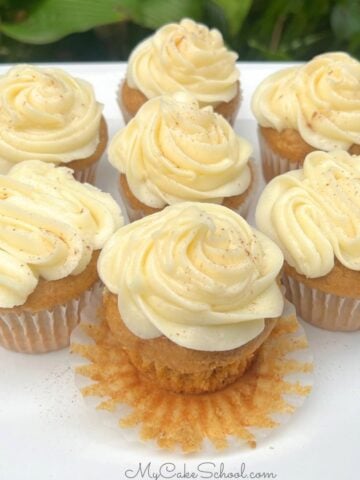Easy Pumpkin Cupcakes on a cake platter.