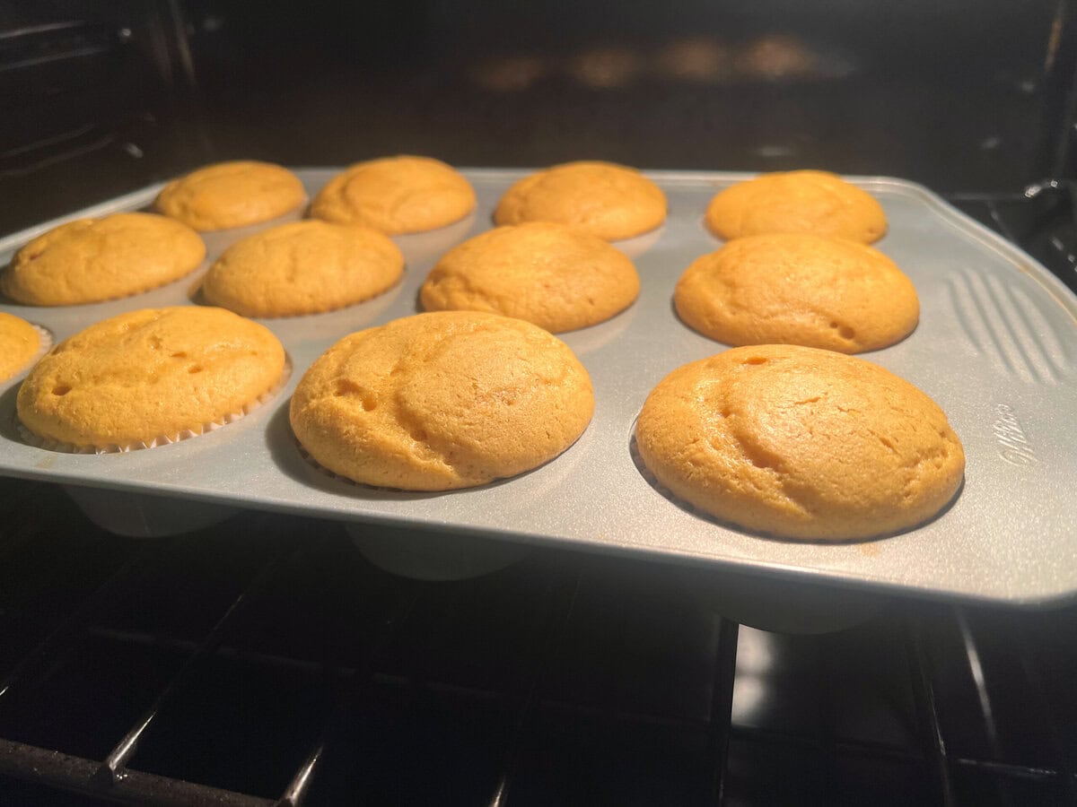 Pumpkin cupcakes baking.